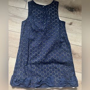 Adorable blue dress with great detail.